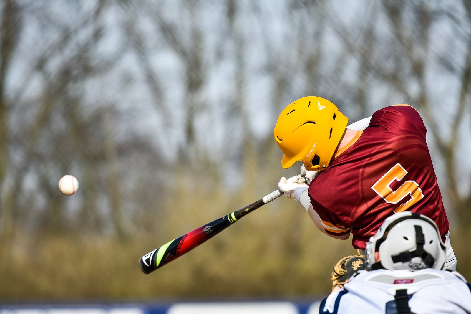 Brock Tatum of Ross gets a piece of the ball during a baseball game against host Edgewood on April 11 in St. Clair Township. NICK GRAHAM/STAFF