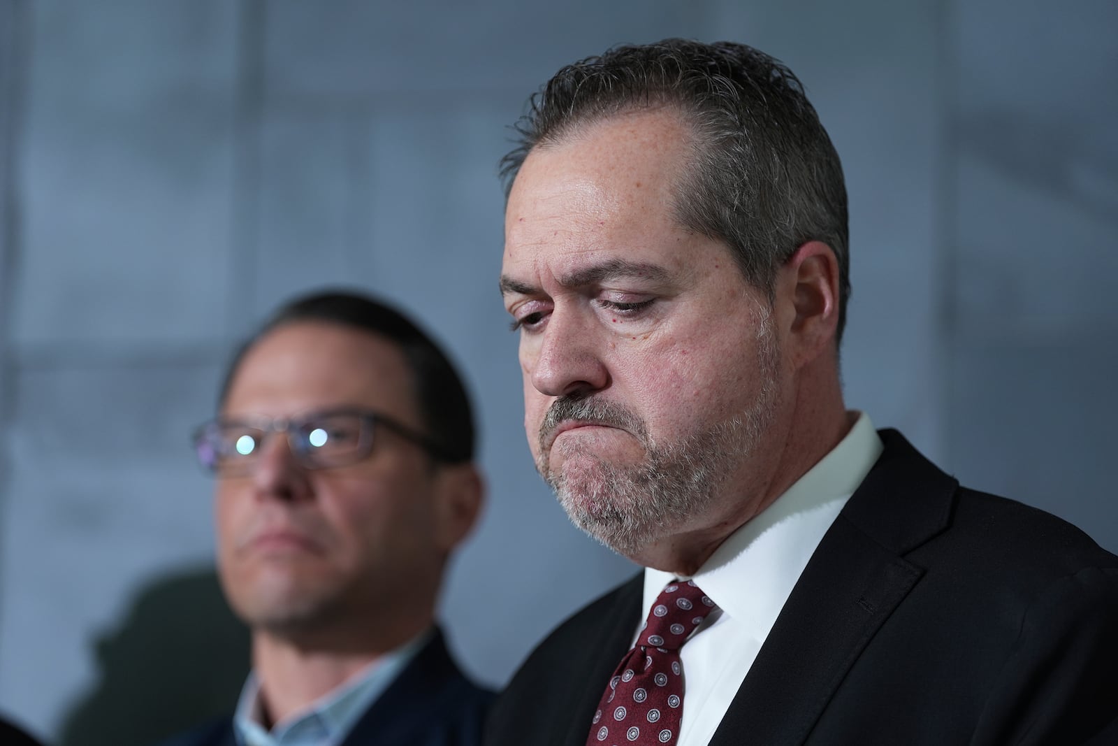 York County District Attorney Timothy J. Barker reacts during a news conference regarding the shooting at UPMC Memorial Hospital in York, Pa. on Saturday, Feb. 22, 2025. (AP Photo/Matt Rourke)