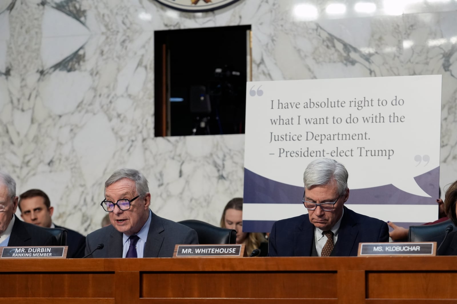 Sen. Dick Durbin, D-Ill., left, makes an opening statement before Pam Bondi, President-elect Donald Trump's choice to lead the Justice Department as attorney general, appears before the Senate Judiciary Committee for her confirmation hearing, at the Capitol in Washington, Wednesday, Jan. 15, 2025. (AP Photo/J. Scott Applewhite)