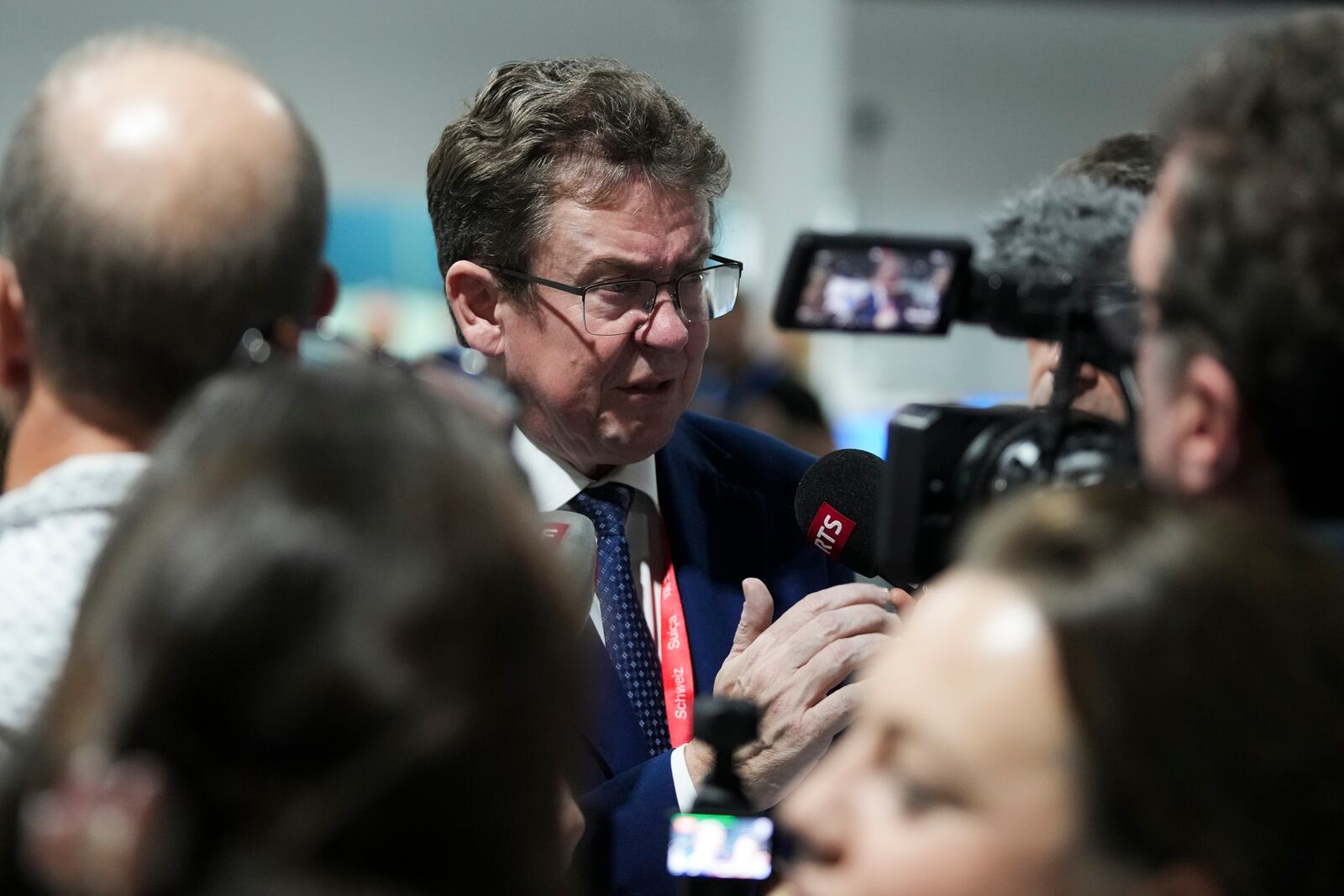 Albert Rosti, of Switzerland, speaks to members of the media at the COP29 U.N. Climate Summit, Friday, Nov. 22, 2024, in Baku, Azerbaijan. (AP Photo/Sergei Grits)