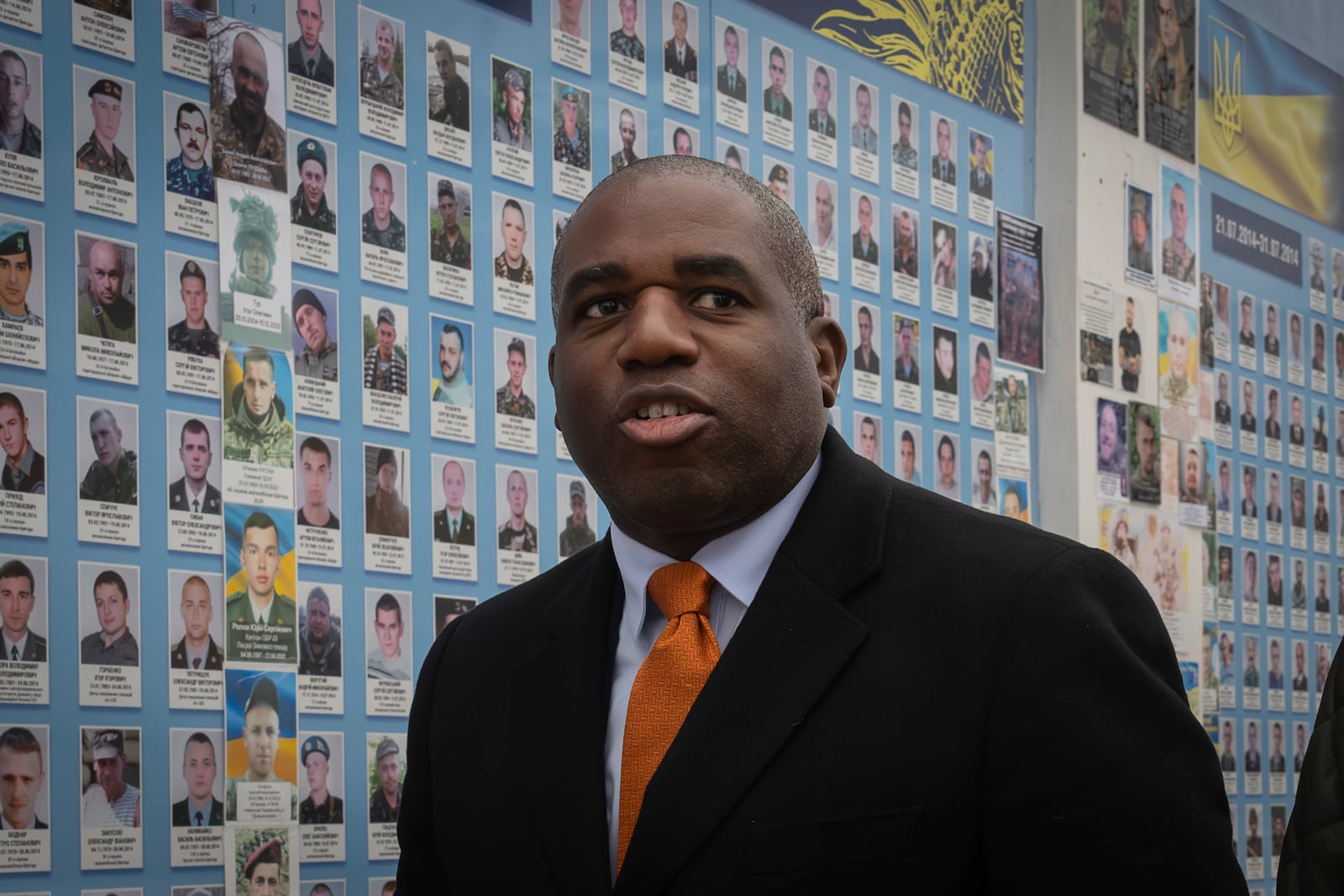 Britain's Foreign Secretary David Lammy attends a flower laying ceremony at the Memory Wall of Fallen Defenders of Ukraine, in Kyiv, Ukraine, Wednesday, Feb. 5, 2025. (AP Photo/Efrem Lukatsky)