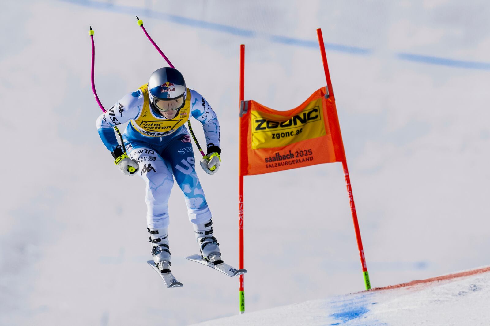 United States' Lindsey Vonn is airborne during a women’s downhill training, at the Alpine Ski World Championships, in Saalbach-Hinterglemm, Austria, Wednesday, Feb. 5, 2025. (Jean-Christophe Bott/Keystone via AP)