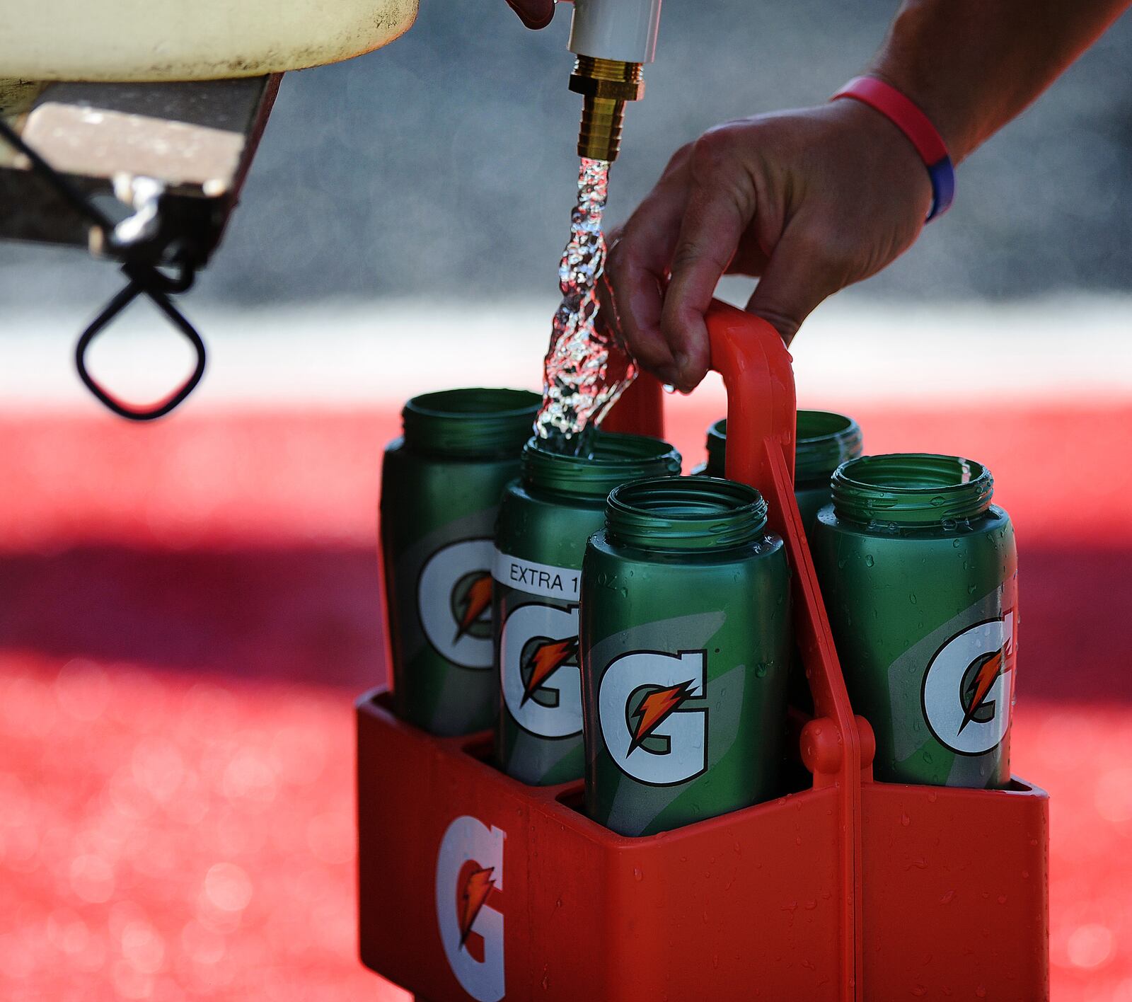 Wayne High School athletic trainer Jonny Nemeth, said his main job is to keep players hydrated during practices Monday, July 31, 2023. MARSHALL GORBY\STAFF