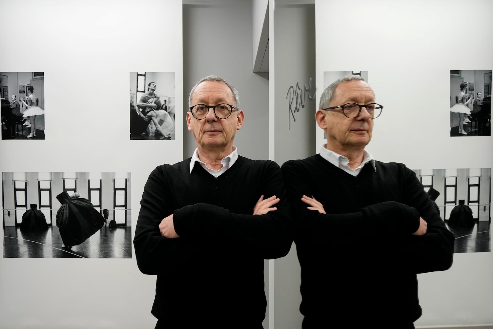 Photographer Gerard Uferas poses during the unveiling of the photo exhibition 'Lo sguardo nascosto' ( The hidden gaze), at the La Scala Opera House in Milan, Italy, Tuesday, Feb. 11, 2025. (AP Photo/Luca Bruno)