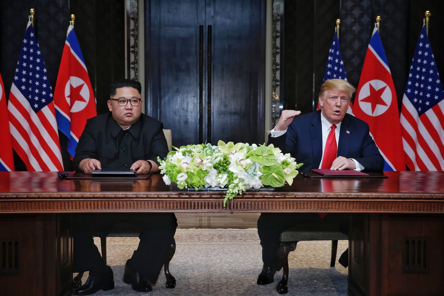 Photos: Trump, Kim Jong Un meet for historic US-North Korea summit