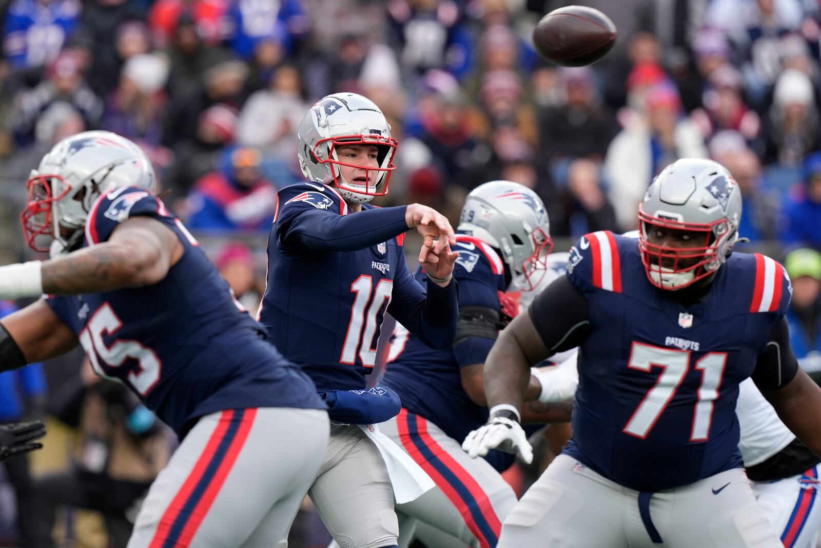 New England Patriots quarterback Drake Maye (10) throws a pass against the Buffalo Bills during the first half of an NFL football game, Sunday, Jan. 5, 2025, in Foxborough, Mass. (AP Photo/Robert F. Bukaty)