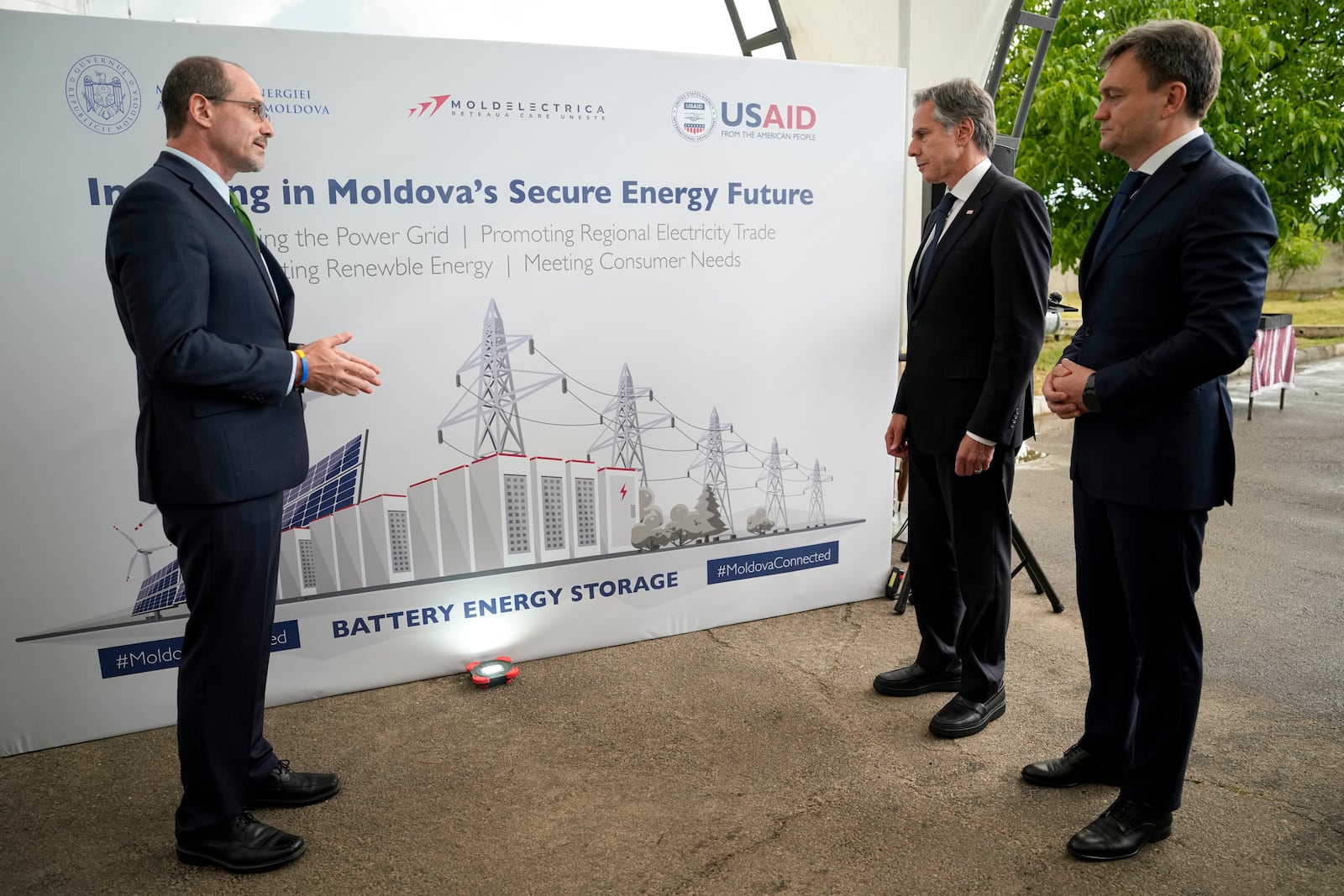 FILE - United States Secretary of State Antony Blinken, center, and Moldova's Prime Minister Dorin Recean, right, listen to USAID Moldova Mission Director Jeff Bryan, left, during a visit to the site of Moldelectrica Chisinau Substation in Braila south of the capital of Moldova, Wednesday, May 29, 2024. (AP Photo/Vadim Ghirda, File)