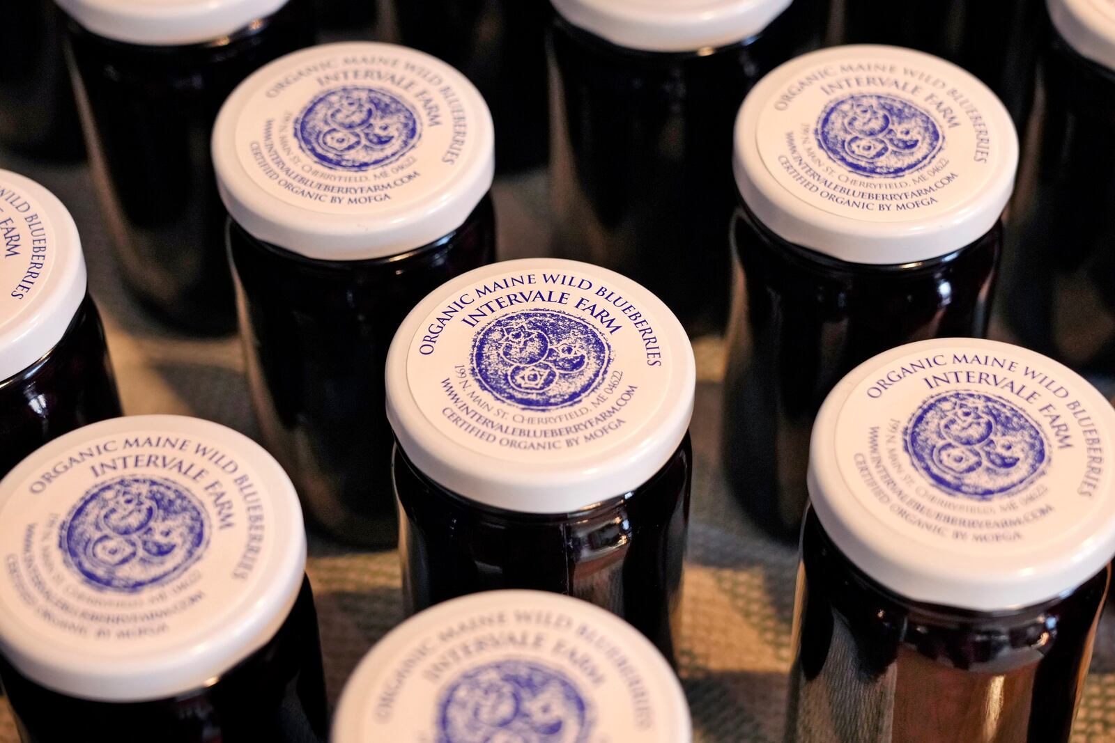 Jars of organic wild blueberry spread are seen at Intervale Farm, Monday, Feb. 10, 2025, in Cherryfield, Maine. (AP Photo/Robert F. Bukaty)