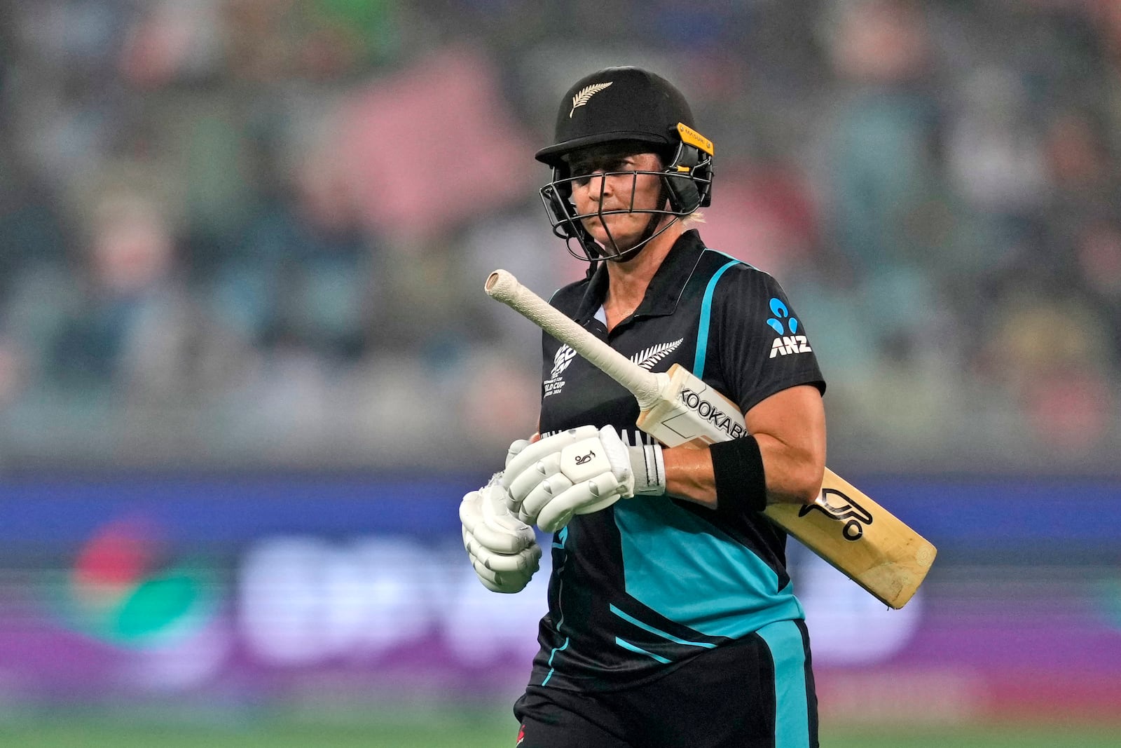 New Zealand's captain Sophie Devine leaves the field after losing her wicket during the ICC Women's T20 World Cup 2024 final match between New Zealand and South Africa at Dubai, United Arab Emirates, Sunday, Oct. 20, 2024. (AP Photo/Altaf Qadri)