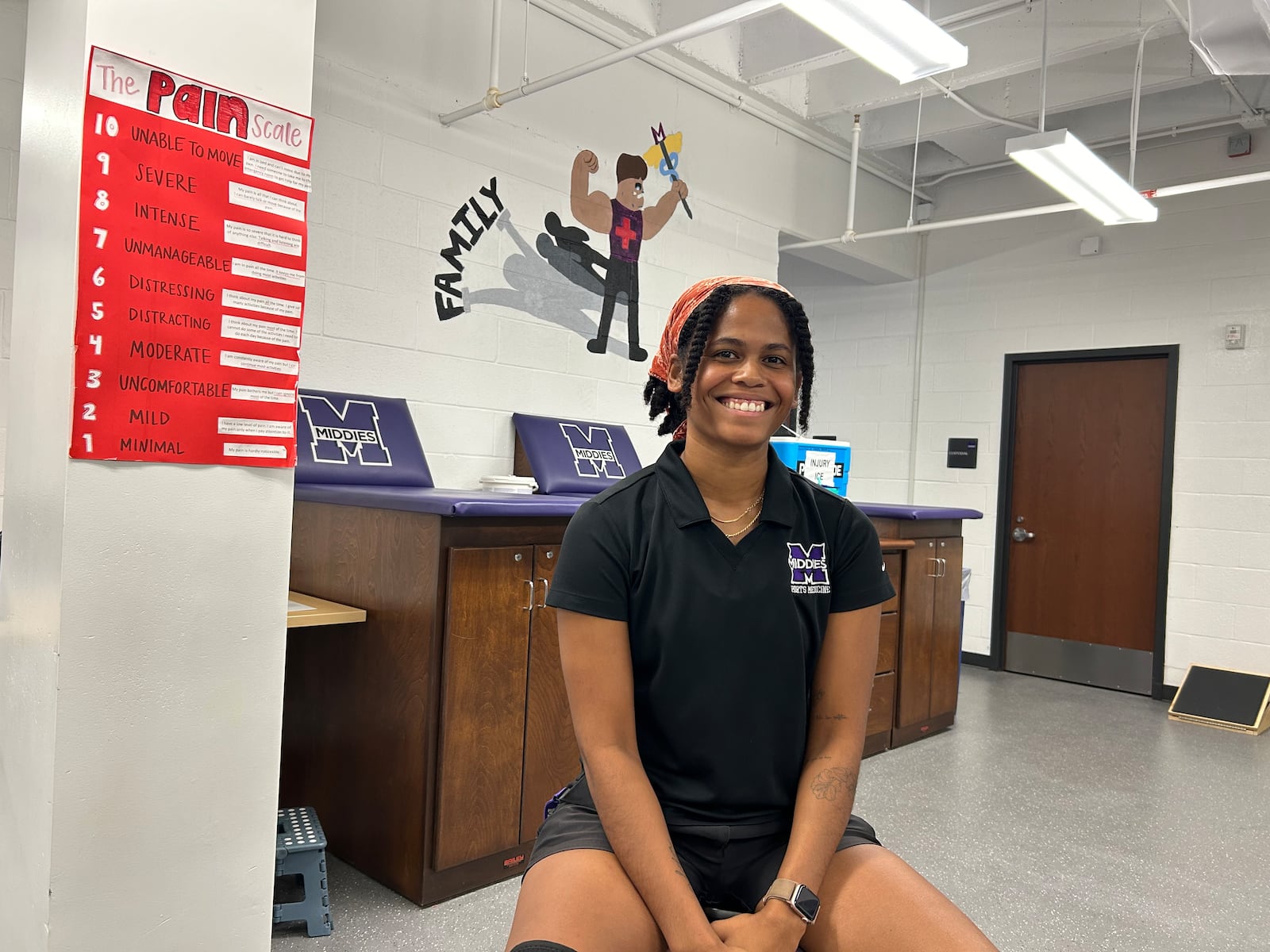 Mariah Woodward, one of the two Middletown High School athletic trainers from Premier Health, helped care for a football official who was injured on Sept. 13 during a game against Sycamore. She has worked at Premier since 2020 and MHS since 202. RICK McCRABB/CONTRIBUTOR