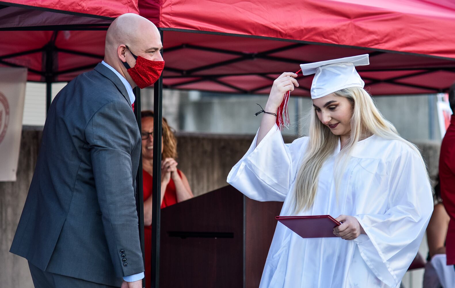 Madison High School drive-thru graduation ceremony at Land of Illusion