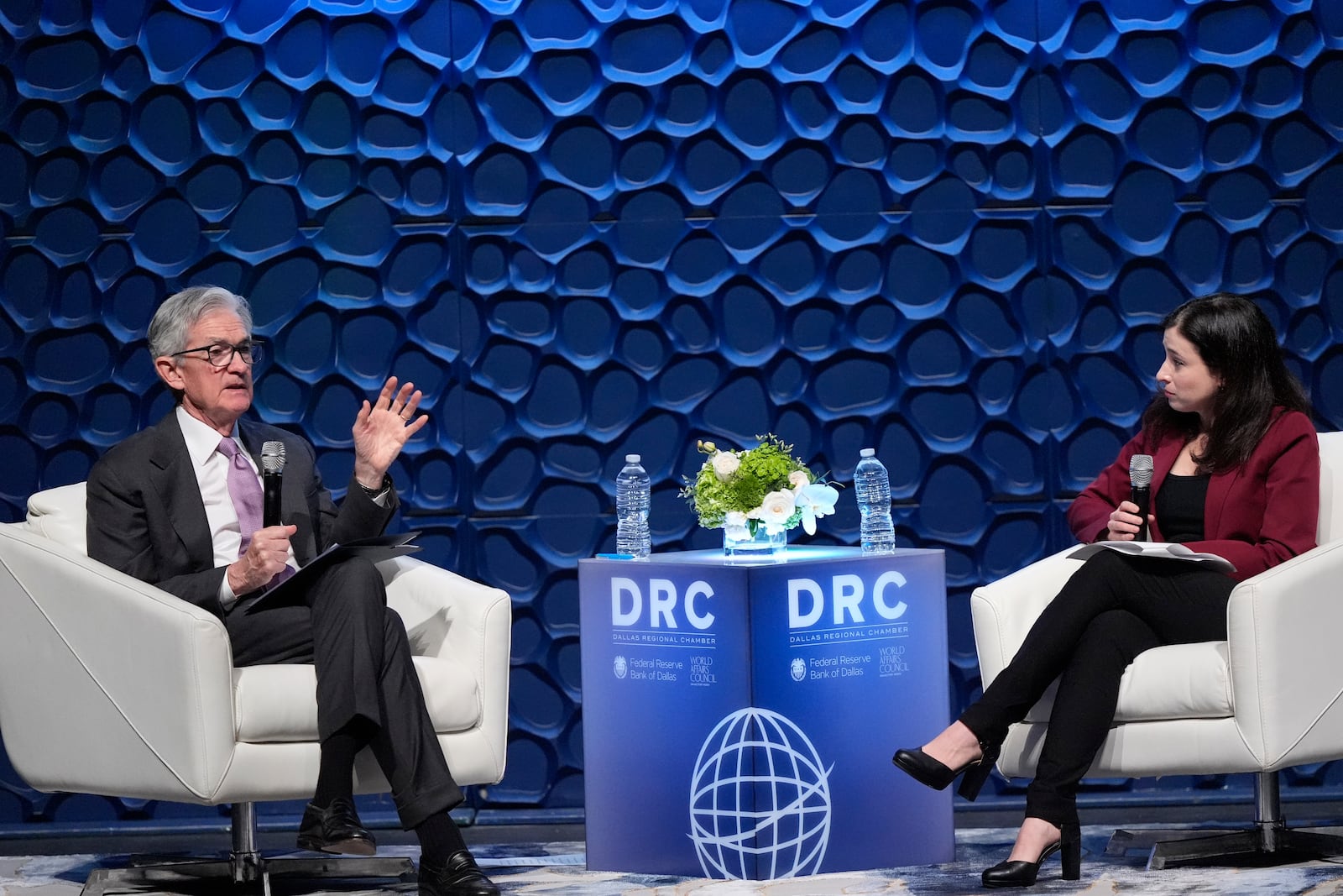 Federal Reserve Chair Jerome Powell, left, speaks to the Dallas Regional Chamber as moderator Catherine Rampell looks during an event in Music Hall at Fair Park Thursday, Nov. 14, 2024, in Dallas. (AP Photo/LM Otero)