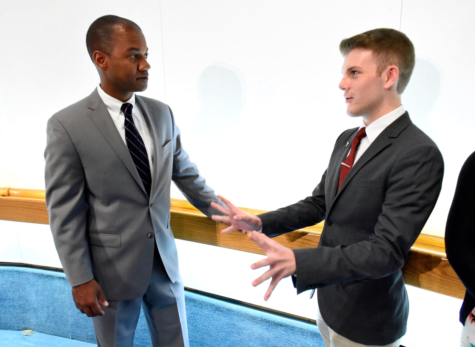 The Middletown City School District Board of Education announced during their meeting Monday night, May 22, that Marlon Styles, Jr., left, will be the new superintendent of the school district. Styles speaks with student representative Zach Banks after the announcement. 