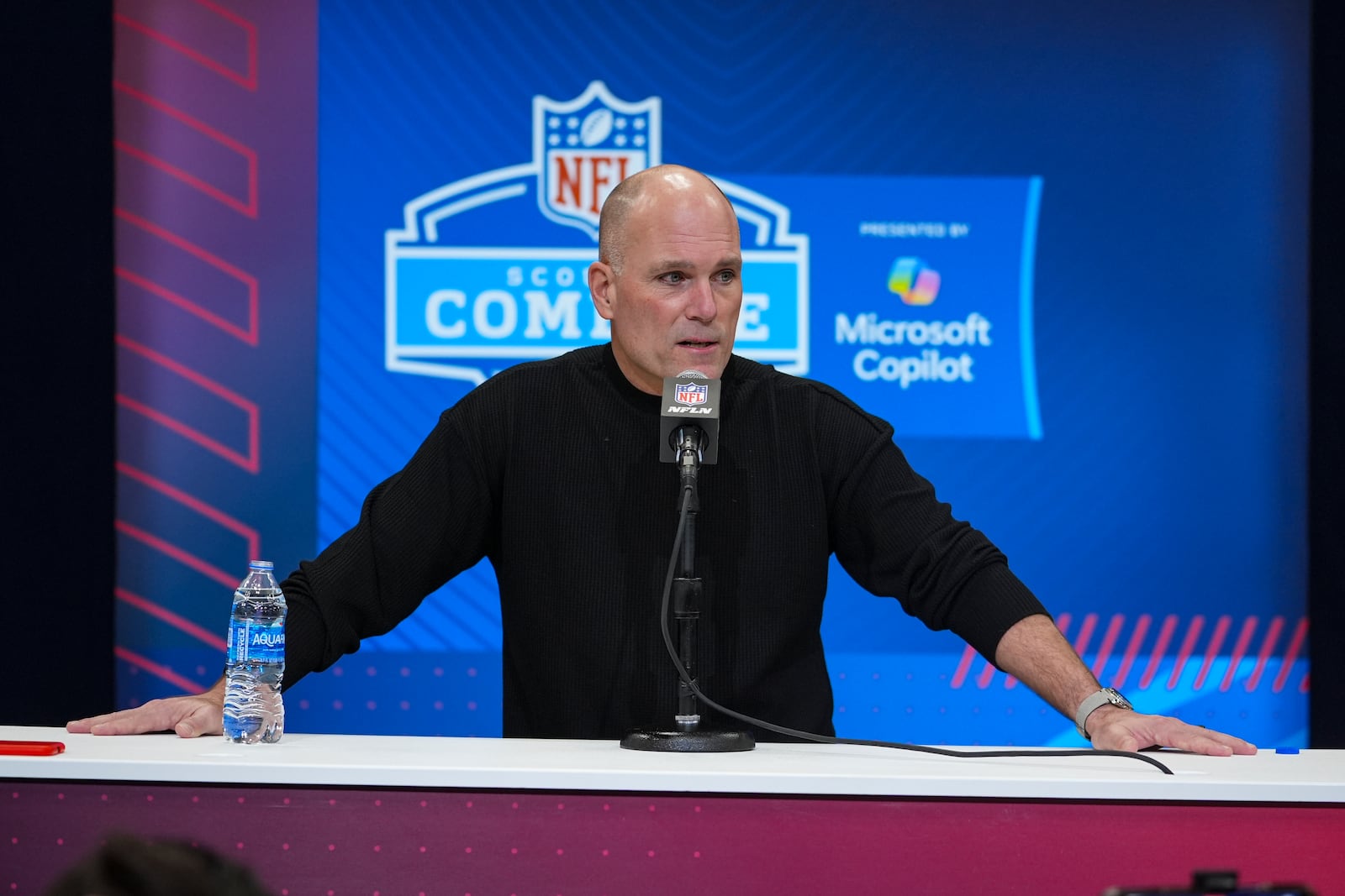 Baltimore Ravens general manager Eric DeCosta speaks during a press conference at the NFL football scouting combine in Indianapolis, Tuesday, Feb. 25, 2025. (AP Photo/Michael Conroy)