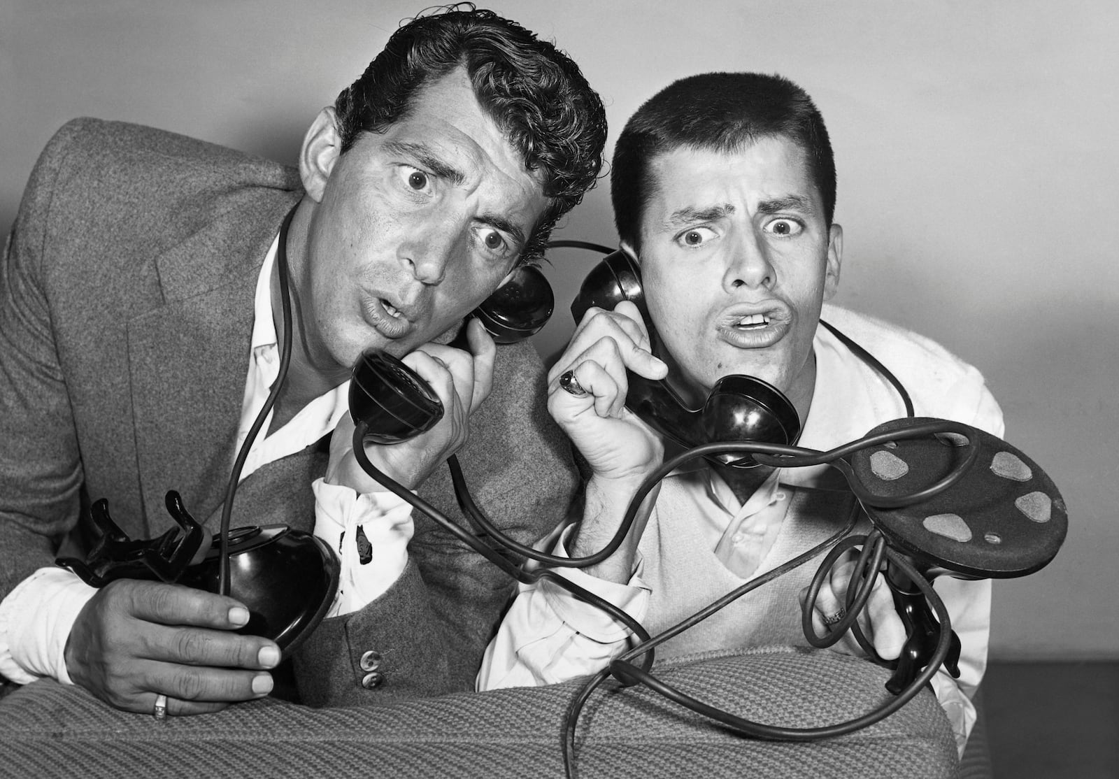 Dean Martin and Jerry Lewis, entertainers and hosts of their own NBC radio show, react at the news that the presentation of Redbook magazine's 14th Annual Silver Cup Movie Award will be made on their show. (Photo by ï¿½ï¿½ John Springer Collection/CORBIS/Corbis via Getty Images)