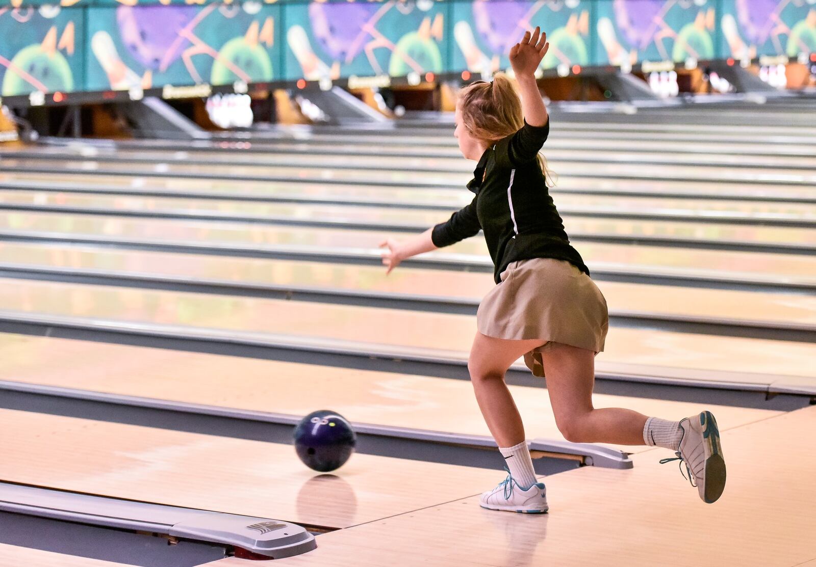 Fenwick’s Madison Lankheit delivers the ball during Thursday’s Division II district bowling tournament at Beaver-Vu Bowl in Beavercreek. NICK GRAHAM/STAFF