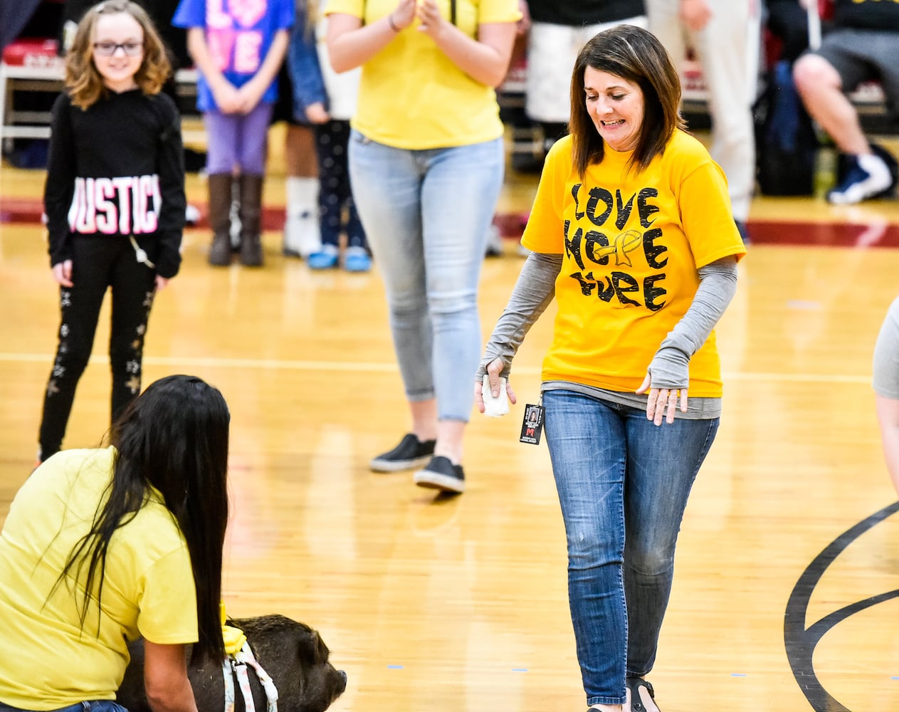 Two Butler County schools hold basketball game to benefit Madison teen battling cancer