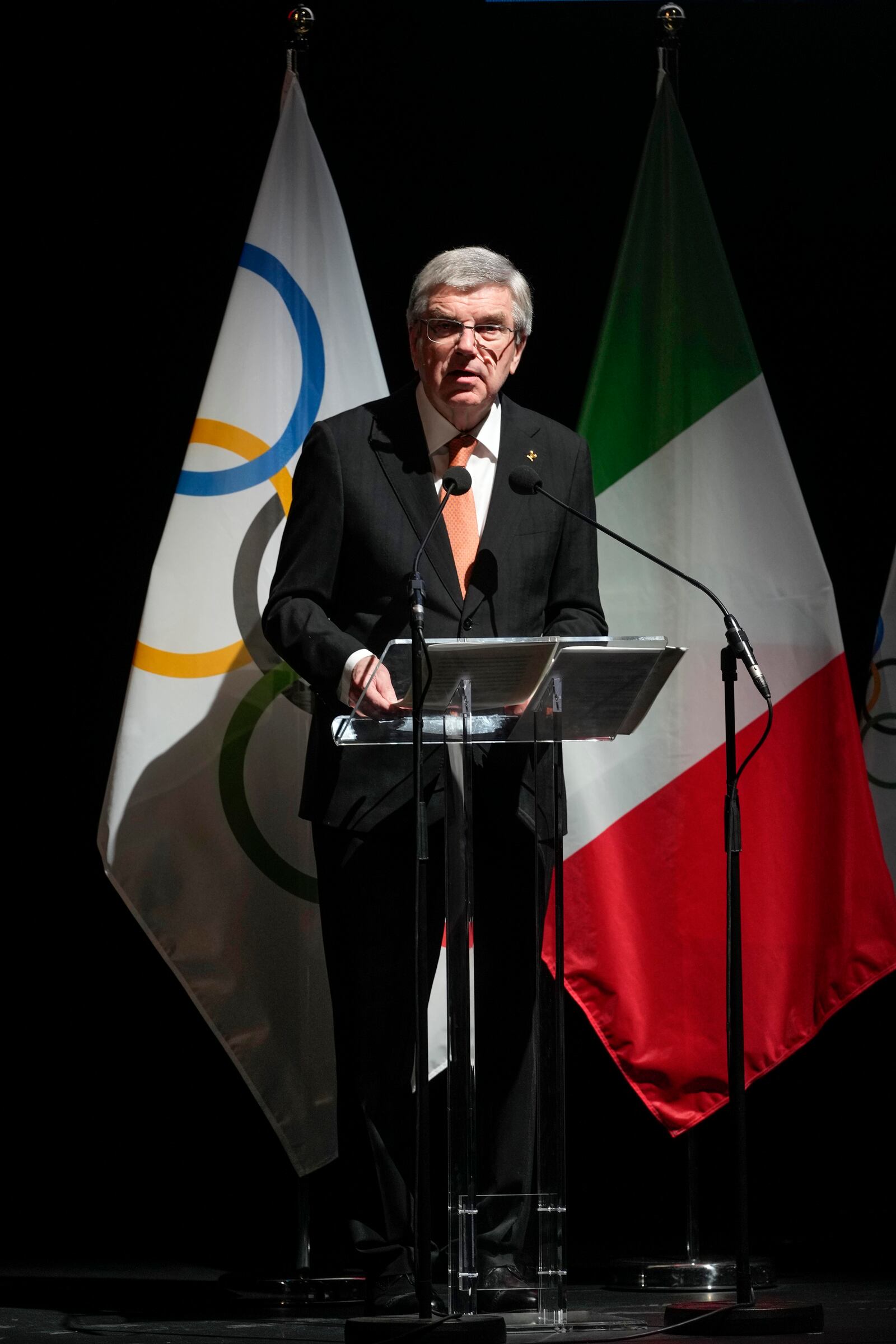 IOC President Thomas Bach attends the ceremony 'One Year To Go' for the 2026 Milano-Cortina Winter Olympics, at the Strehler Theatre, in Milan, Thursday, Feb. 6, 2025. (AP Photo/Luca Bruno)