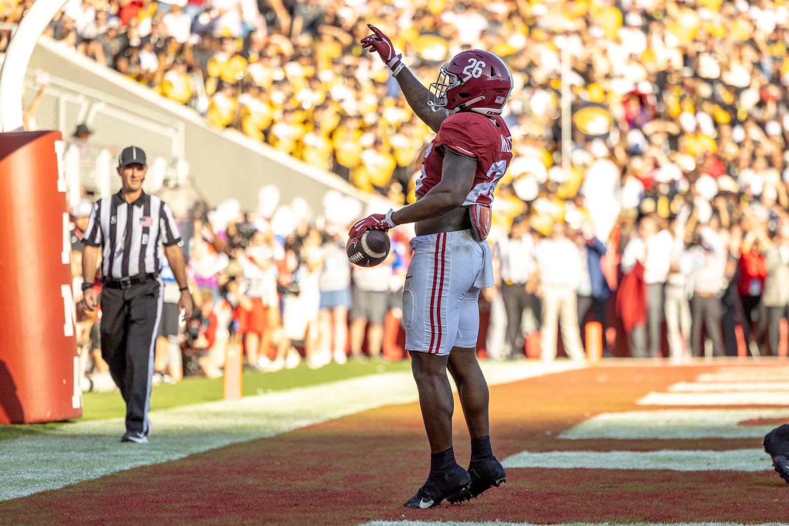 Alabama running back Jam Miller (26) celebrates after a touchdown run during the first half of an NCAA college football game against Missouri, Saturday, Oct. 26, 2024, in Tuscaloosa, Ala. (AP Photo/Vasha Hunt)