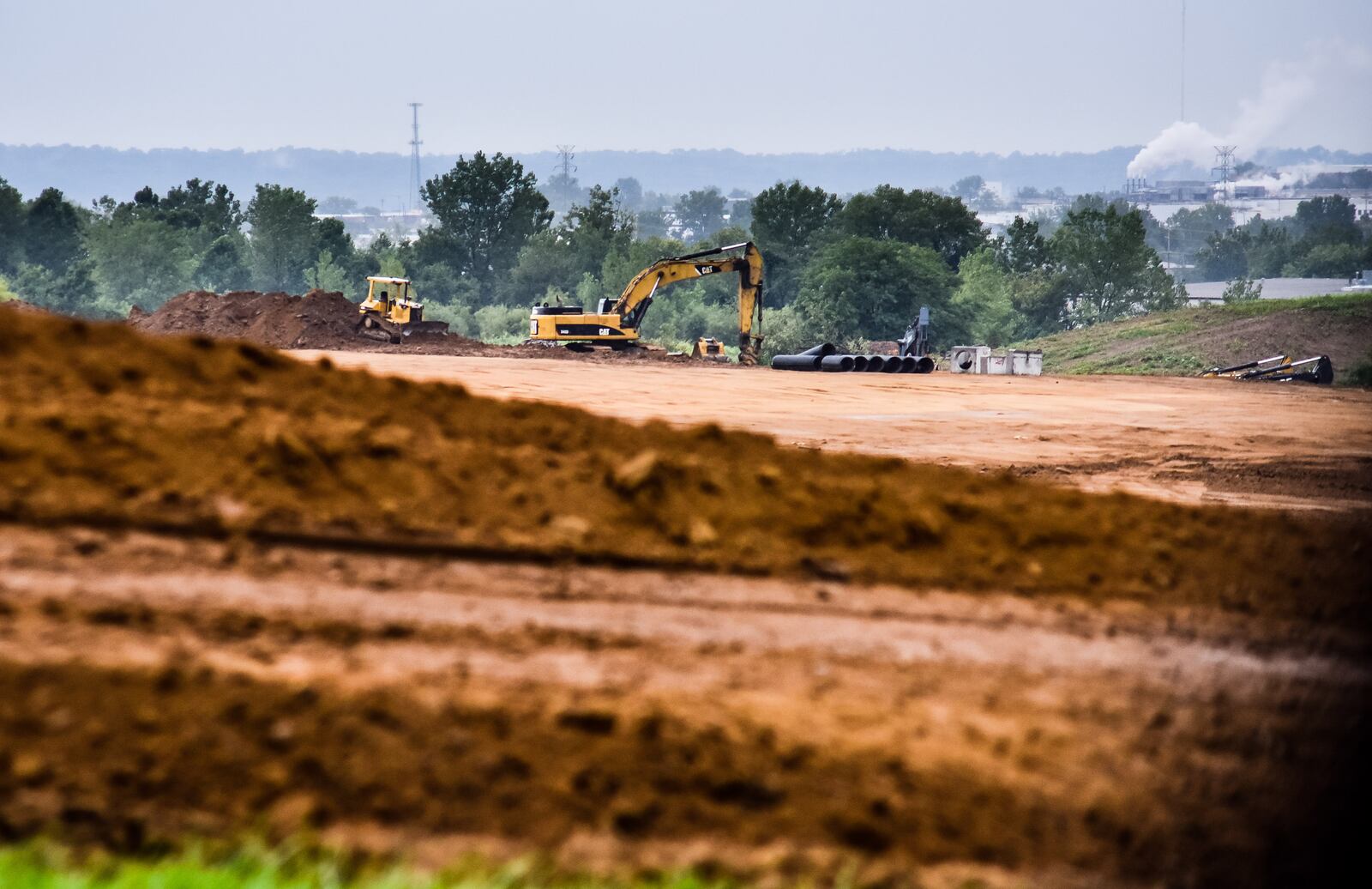 Work on the $50 million development known as Fairfield Commerce Park at the former Liberty Mutual property on Seward Road progresses. Property owner Ambrose Property Group aims to fill the employment void created by Liberty Mutual leaving Fairfield with hundreds of jobs. Ambrose Property plans to lease buildings to companies looking for space. Ambrose Property plans to build two new buildings with the possibility of others being built in the coming years. NICK GRAHAM/STAFF