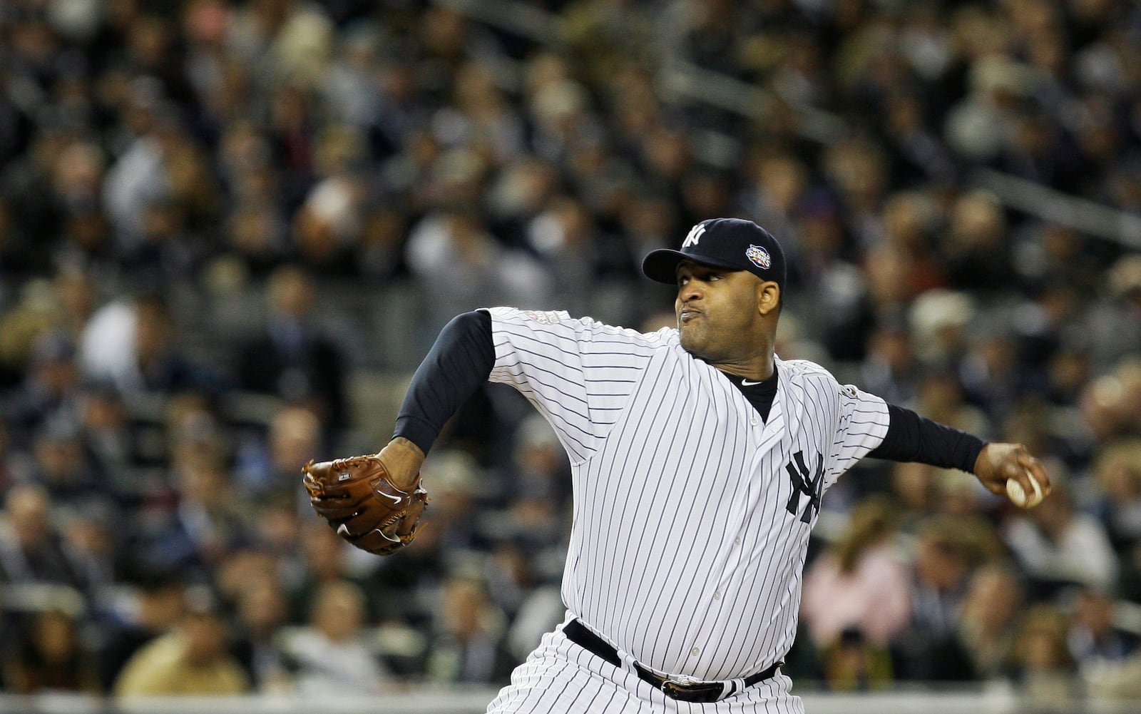 FILE- New York Yankees' CC Sabathia throws during the first inning of Game 1 of the Major League Baseball's World Series against the Philadelphia Phillies Wednesday, Oct. 28, 2009, in New York. (AP Photo/David J. Phillip, File)