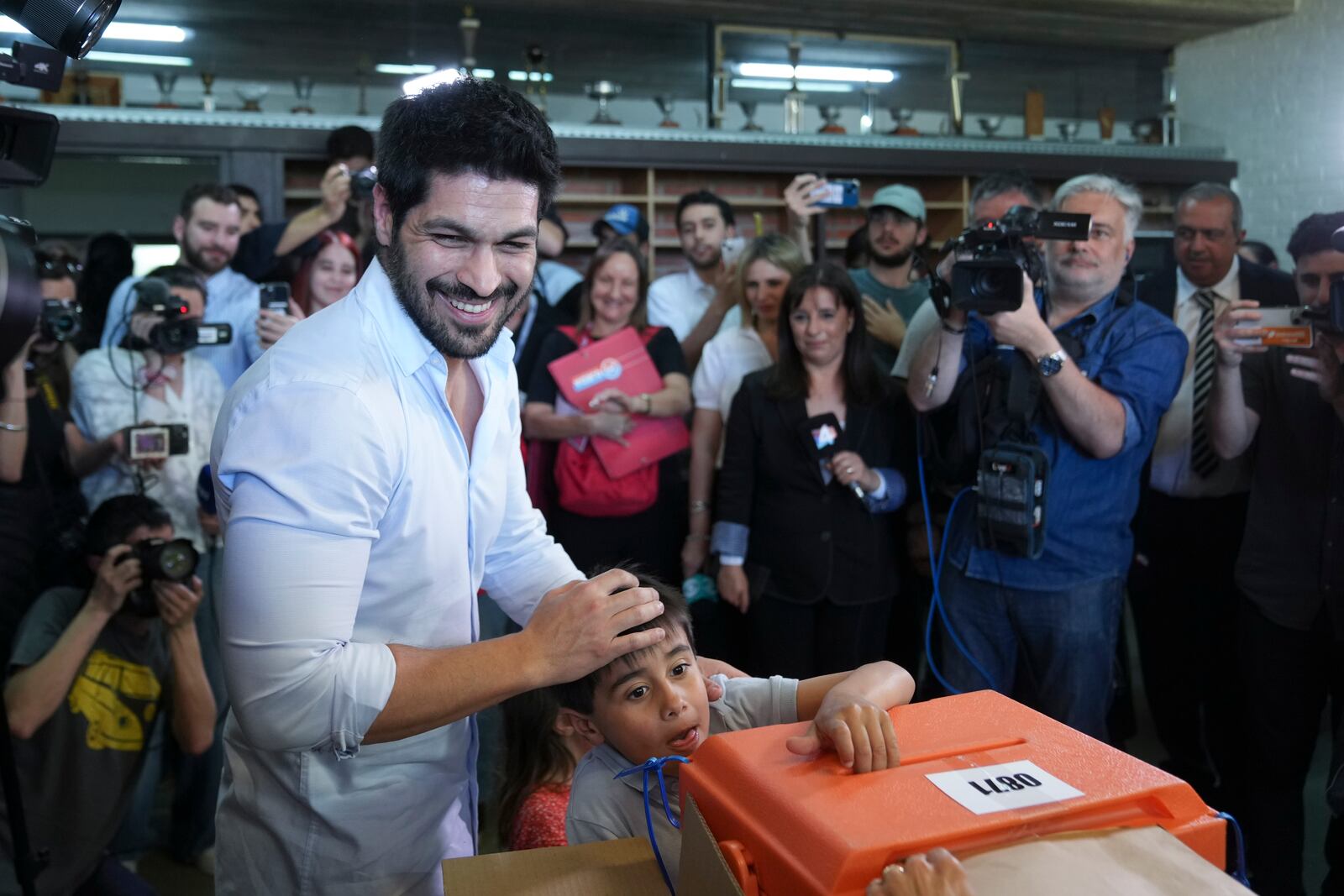 Andres Ojeda, Colorado Party presidential candidate, smiles after voting at a polling station during general elections in Montevideo, Uruguay, Sunday, Oct. 27, 2024. (AP Photo/Matilde Campodonico)