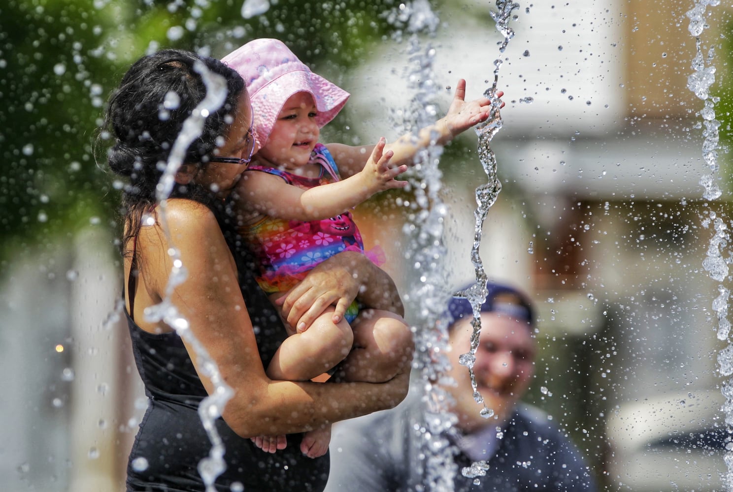 Warm water welcomes people trying to beat the heat