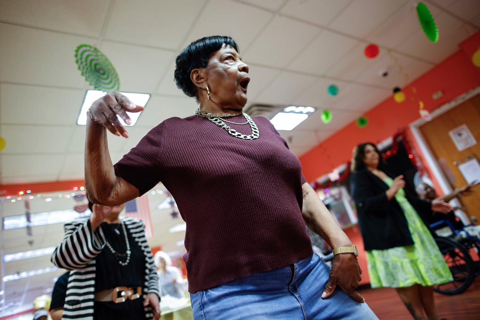 People attend a Zumba exercise class at Sunshine Adult Day Center in Bergenfield, N.J., Monday, Aug. 26, 2024. (AP Photo/Kena Betancur)