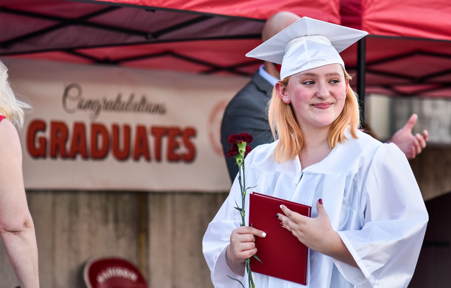 Madison High School drive-thru graduation ceremony at Land of Illusion