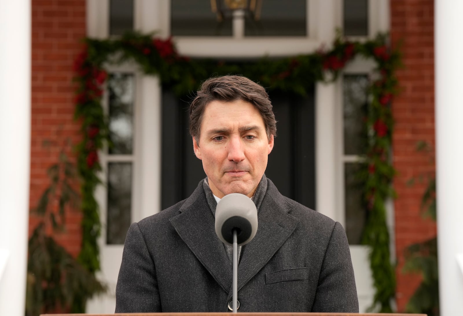 Canada Prime Minister Justin Trudeau makes an announcement outside Rideau Cottage in Ottawa on Monday, Jan. 6, 2025. (Adrian Wyld/The Canadian Press via AP)