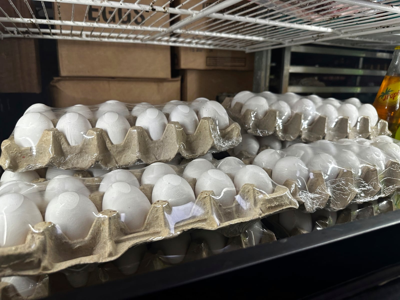 Cartons of eggs sit inside cooler at Norma's Sweets Bakery Tuesday, Feb. 11, 2025, in New Orleans. (AP Photo/Stephen Smith)