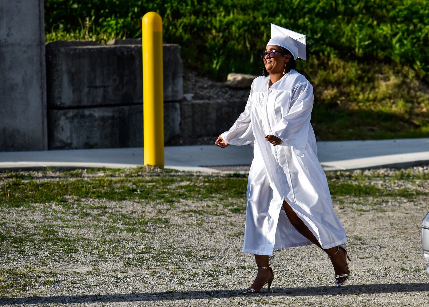 Madison High School drive-thru graduation ceremony at Land of Illusion