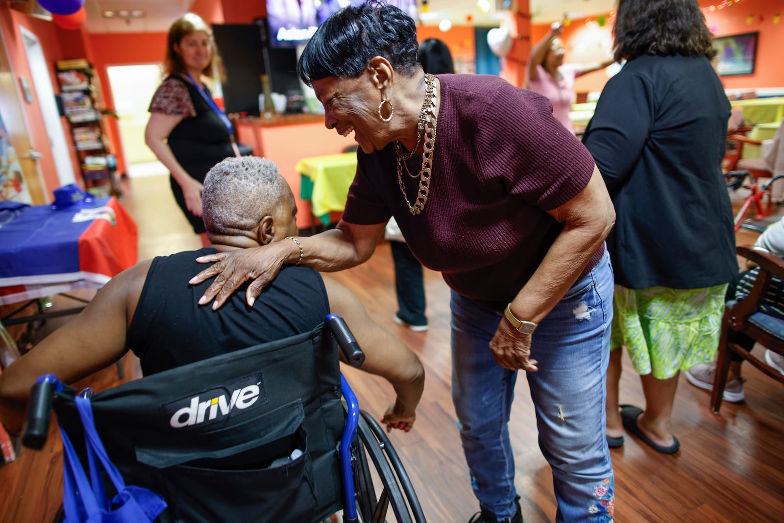 People attend a Zumba exercise class at Sunshine Adult Day Center in Bergenfield, N.J., Monday, Aug. 26, 2024. (AP Photo/Kena Betancur)