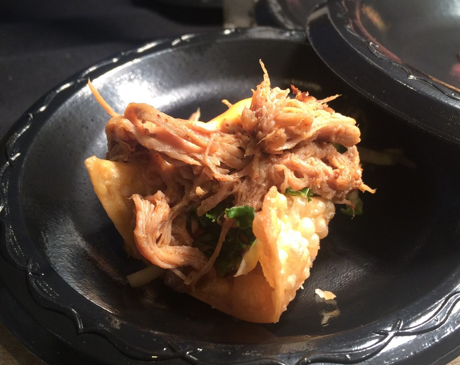 The Chili Lime Spicy Pulled Pork Tostada from Basil s On Market in Troy. File photo by VIVIENNE MACHI