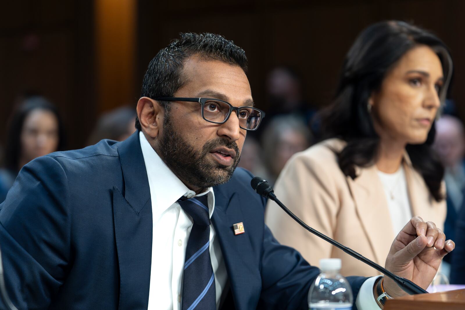 FBI Director Kash Patel, joined at right by Director of National Intelligence Tulsi Gabbard, answers questions as the Senate Intelligence Committee holds its worldwide threats hearing, on Capitol Hill in Washington, Tuesday, March 25, 2025. (AP Photo/J. Scott Applewhite)