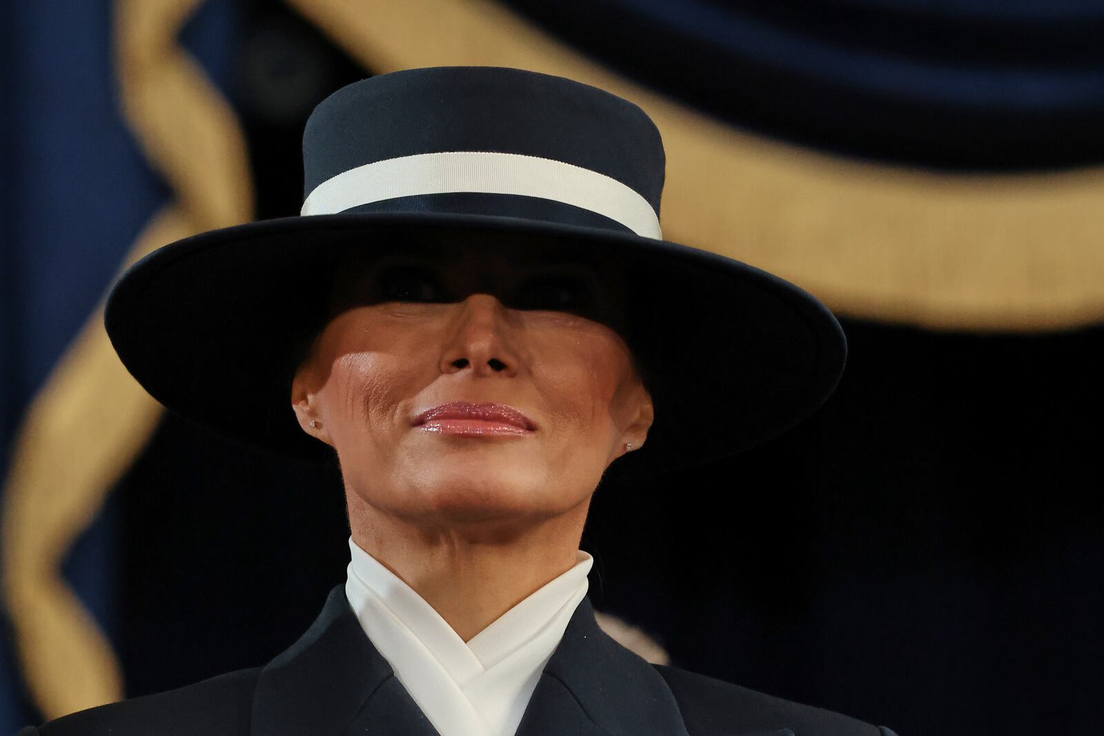 Melania Trump stands during the 60th Presidential Inauguration in the Rotunda of the U.S. Capitol in Washington, Monday, Jan. 20, 2025. (Chip Somodevilla/Pool Photo via AP)