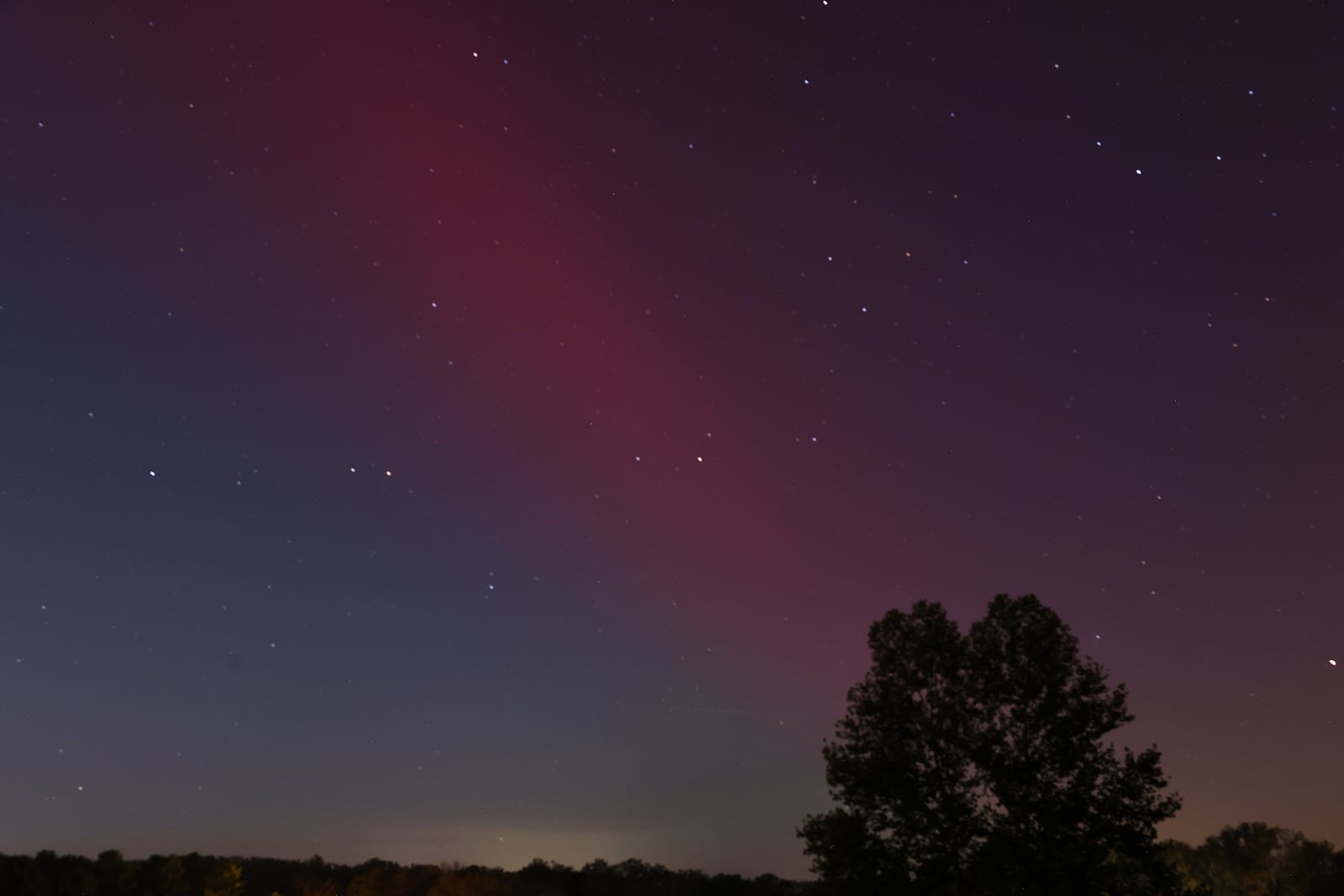 The Aurora Borealis, or northern lights, was visible from Ohio Thursday, Oct. 10, 2024. This was in Madison Township in Butler County. NICK GRAHAM/STAFF