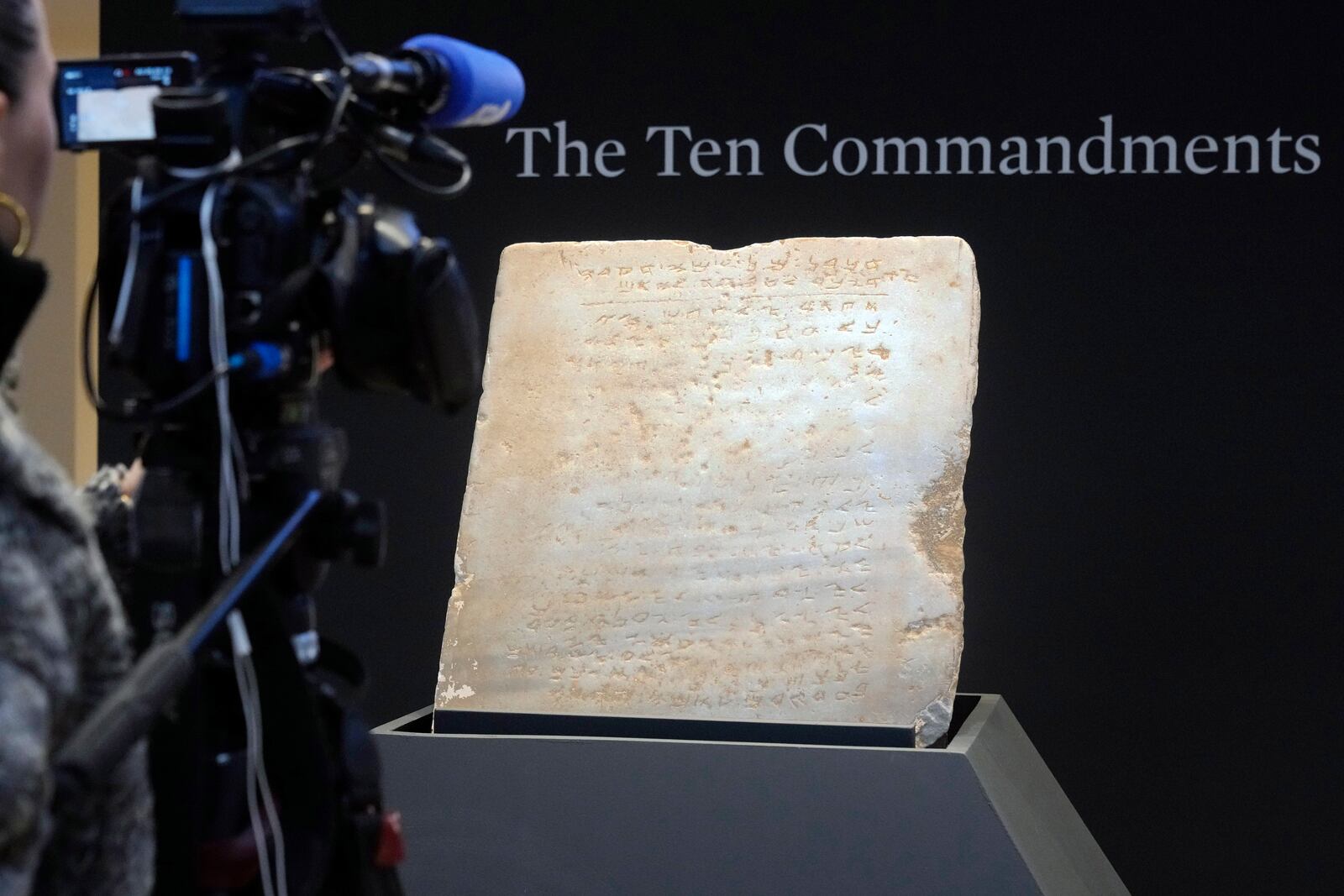 The oldest complete tablet of the Ten Commandments, weighing 115-pounds and approximately 1,500 years old, is displayed at Sotheby's, in New York, Monday, Dec. 9, 2024, where it is to be offered for auction in a single lot sale, Dec, 18, 2024. (AP Photo/Richard Drew)