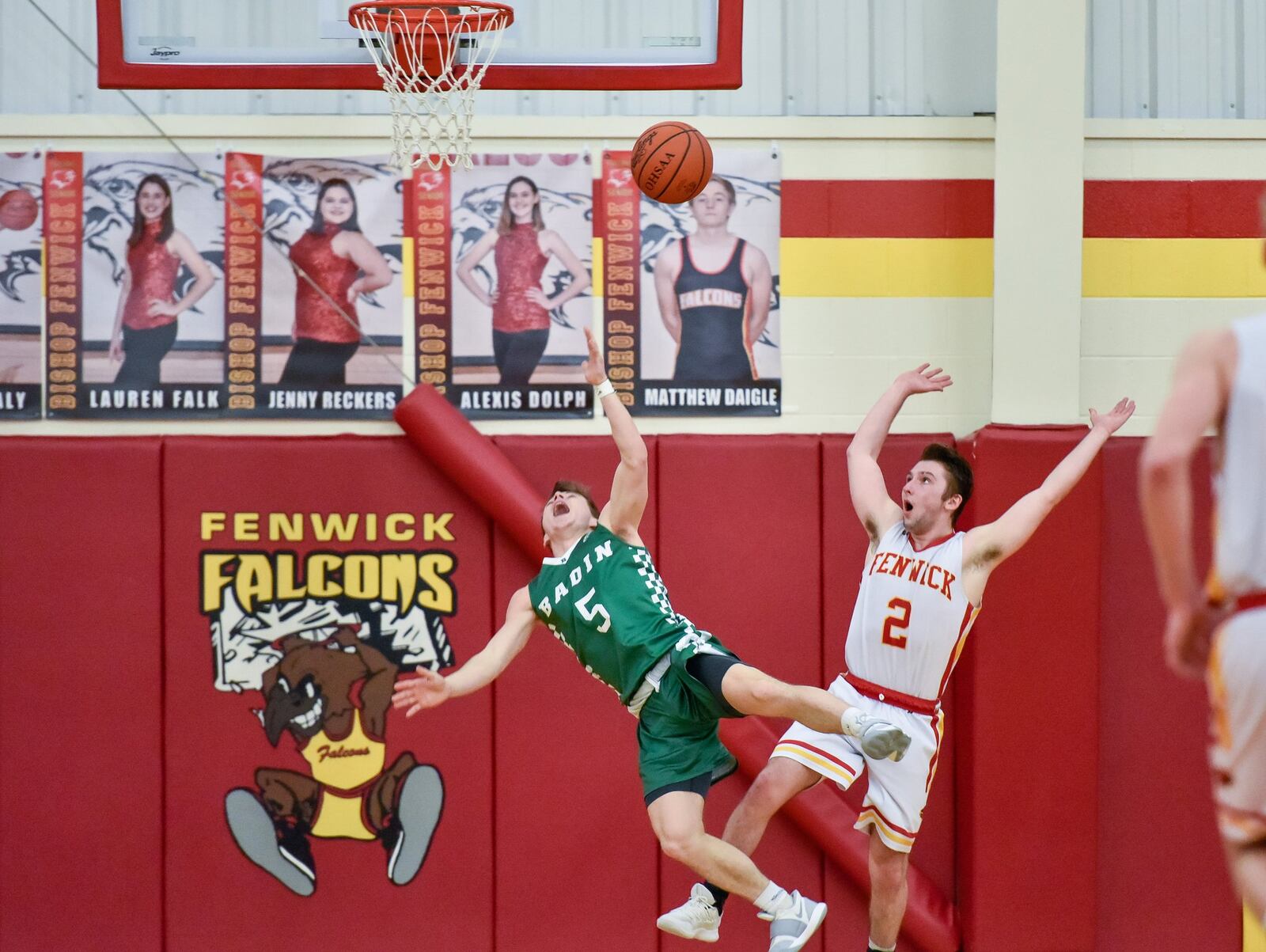 Badin’s Donovan Watkins (5) goes to the basket against Fenwick’s Jared Morris during Friday night’s game in Middletown. Fenwick won 56-45. NICK GRAHAM/STAFF