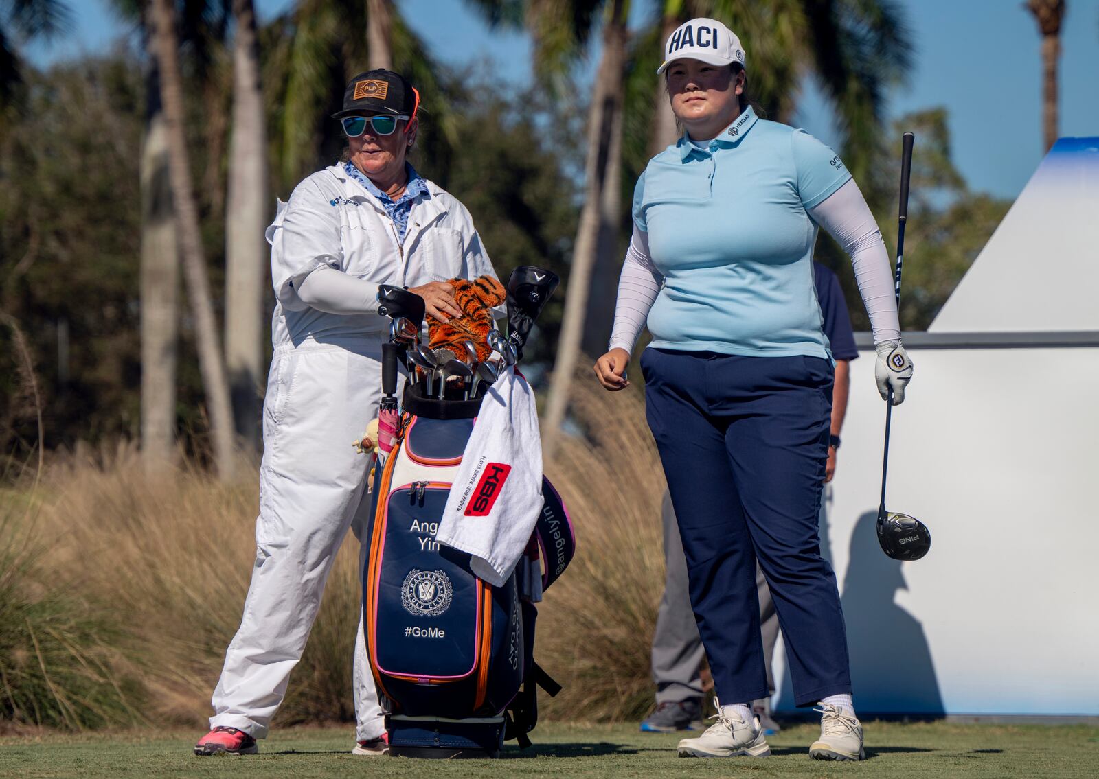 Angel Yin, right, looks down the fairway on the ninth hole during the final round of the LPGA CME Group Tour Championship golf tournament Sunday, Nov. 24, 2024, in Naples, Fla. (AP Photo/Chris Tilley)