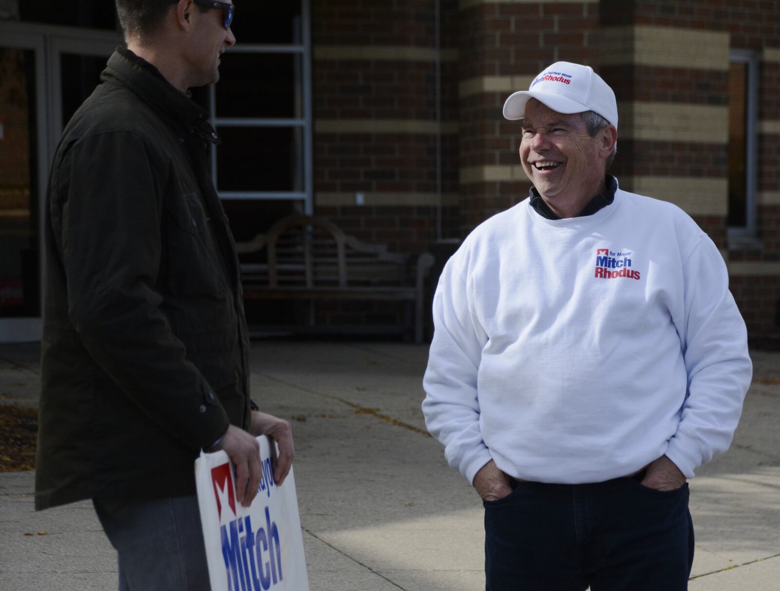 Former Fairfield City Council member Mitch Rhodus campaigns at Fairfield High School on Holden Boulevard in Fairfield on Election Day, Nov. 2, 2021, in his bid for the city's mayor. He is running against former council member and former vice mayor Debbie Pennington. MICHAEL D. PITMAN/STAFF