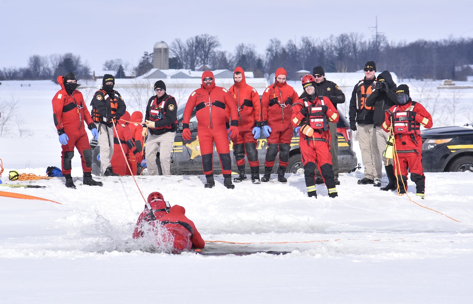 The Butler County Sheriff's Office held a water rescue training on an ice covered pond Tuesday,  February 16, 2021 on Tolbert Road in Wayne Township. NICK GRAHAM / STAFF