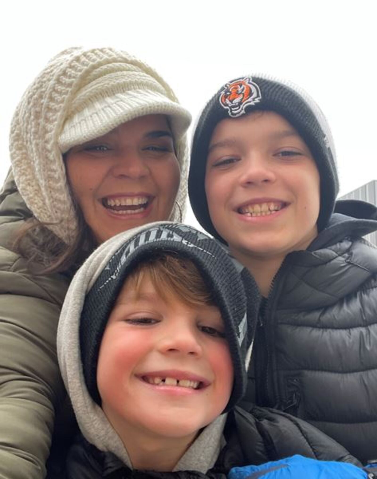 This Middletown family was all smiles at a Bengals game this season at Paul Brown Stadium. Ami Vitori is pictured with two of her sons, Marco, 11, and Hutton, 6. SUBMITTED PHOTO