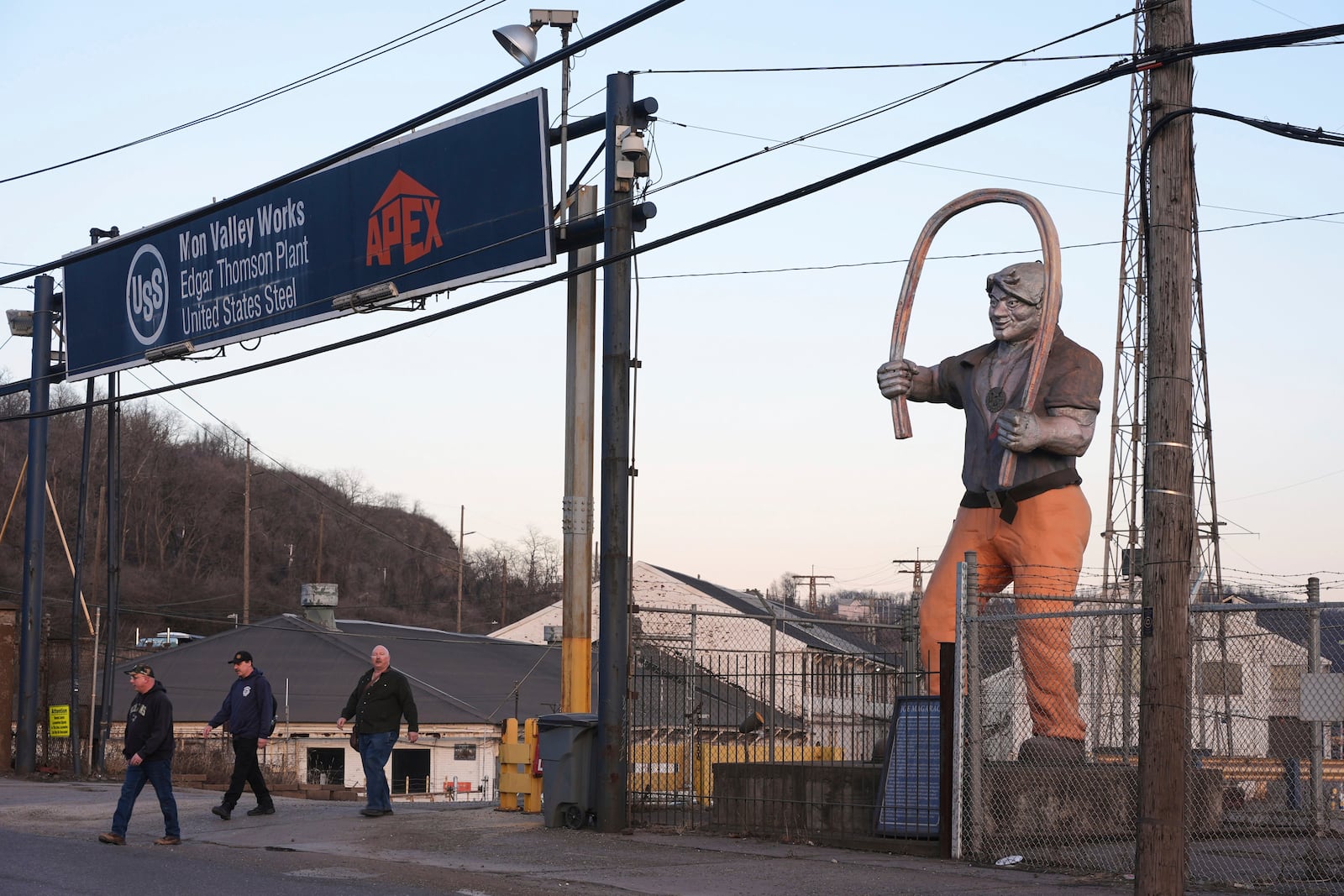 Workers at the United States Steel Corporations Edgar Thomson Plant end their shift at the plant on Tuesday, March 4, 2025, in Braddock, Pa. (AP Photo/Gene J. Puskar)