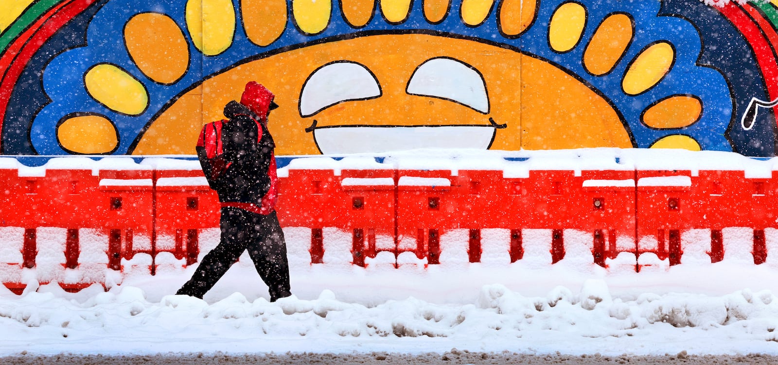 George Ray walks home from the bus stop in the West End neighborhood of St. Louis, Mo., on Friday, Jan. 10, 2025. (Robert Cohen/St. Louis Post-Dispatch via AP)