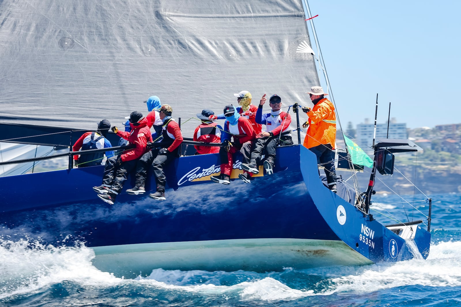 In this photo provided by Salty Dingo, Philippines entry Centennial sails towards the heads after the start of the Sydney to Hobart yacht race in Sydney, Thursday, Dec. 26, 2024. (Salty Dingo via AP)