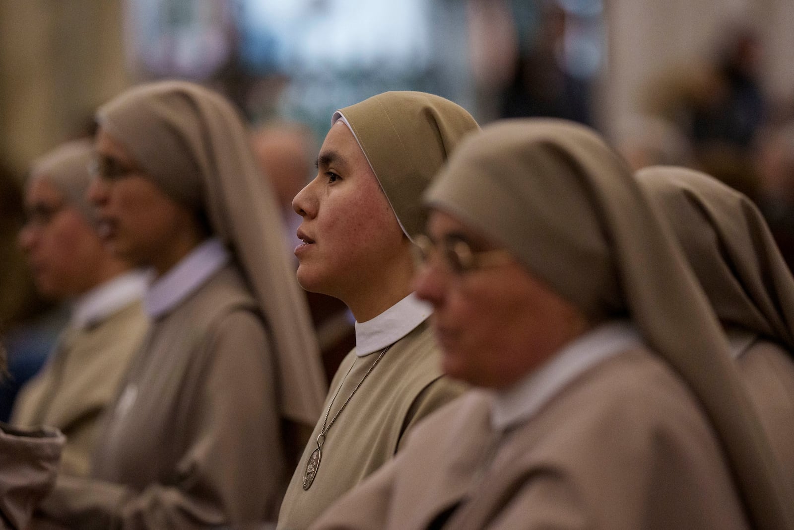 Nuns pray for Pope Francis at Almudena Cathedral in Madrid, Spain, on Thursday, Feb. 27, 2025. (AP Photo/Manu Fernandez)