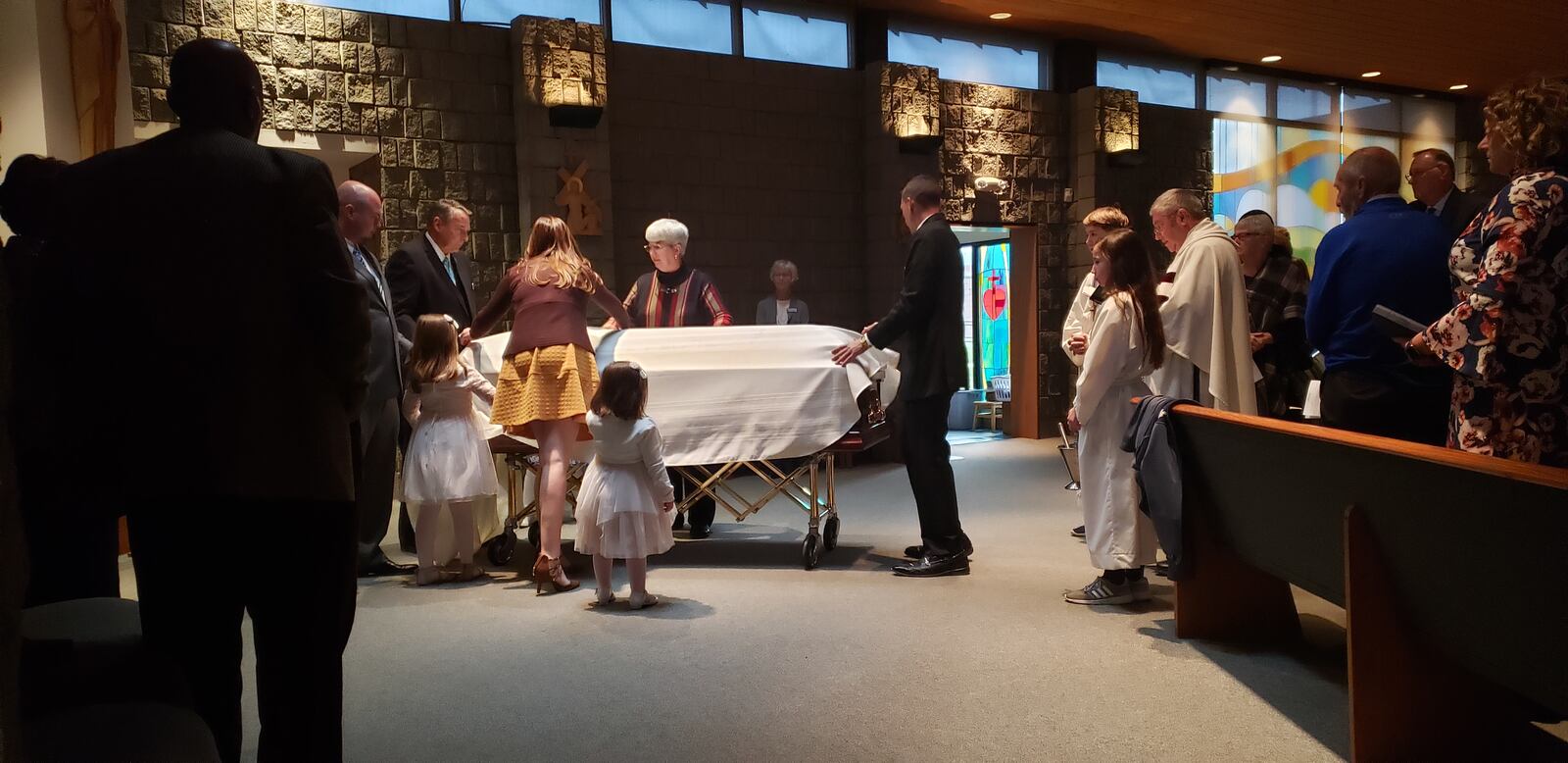 Throngs of families and educators turned out to the funeral of Tom Alf at Sacred Heart of Jesus Church in Fairfield Monday, Nov. 18, 2019. Alf, who died Nov. 13 at 70 years old, was in his 50th year in education. He had just won re-election to the school board of Hamilton school district. ERIC SCHWARTZBERG/STAFF