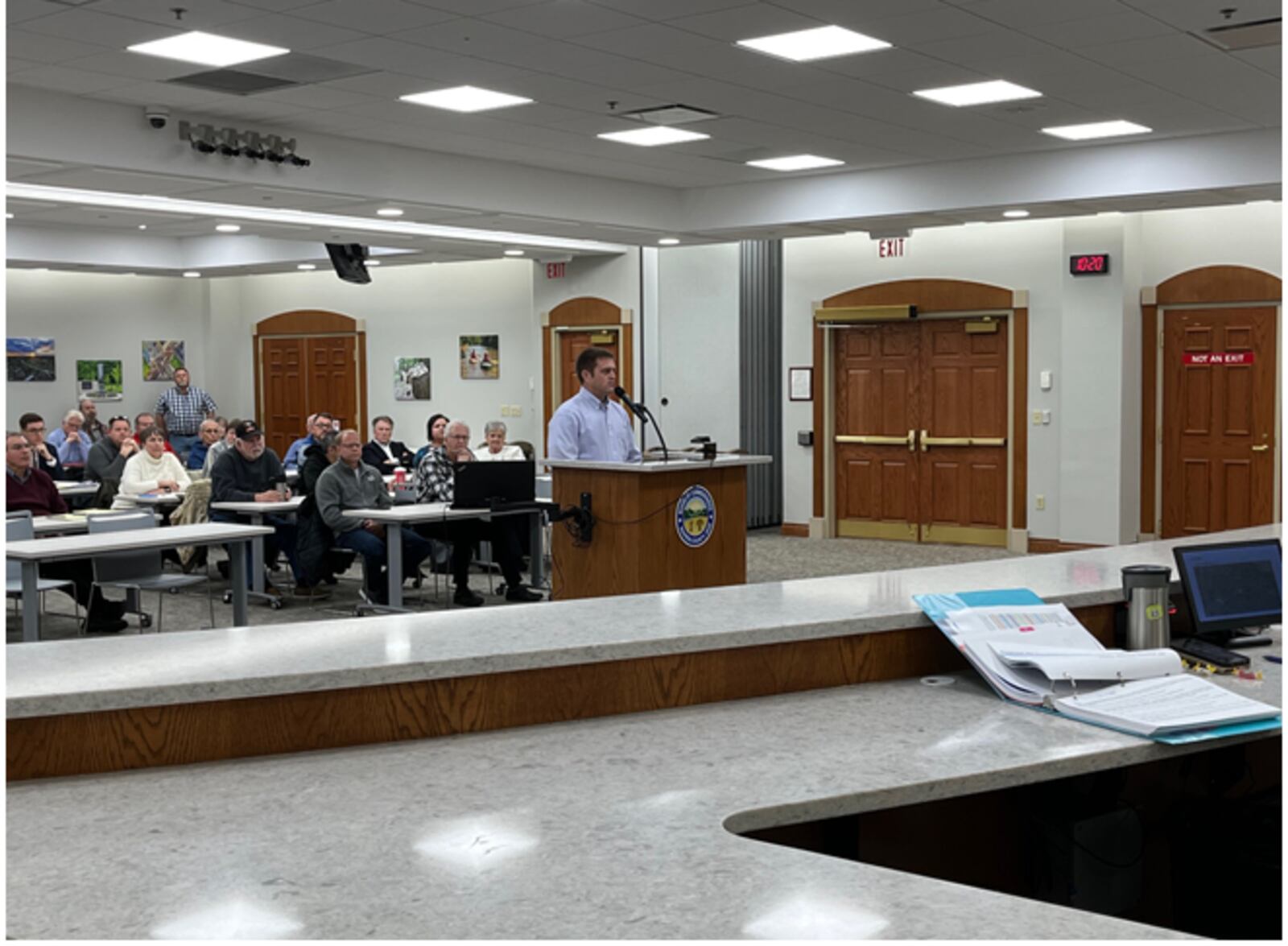 Tyler Holden of Blue Rock Properties makes his case for a rezoning request for 30 acres in Union Twp. before the Warren County Commission on Tuesday, Jan. 30, 2024. After a two-hour hearing, Holden opted to withdraw his request. More than 40 residents who opposed the request attended the meeting, but did not speak after Holden withdrew his request. ED RICHTER/STAFF