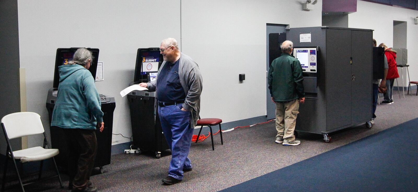 Voters cast ballots Tuesday at the Washington Twp. Recreation Center for the first time on new machines purchased by Montgomery County. CHRIS STEWART / STAFF